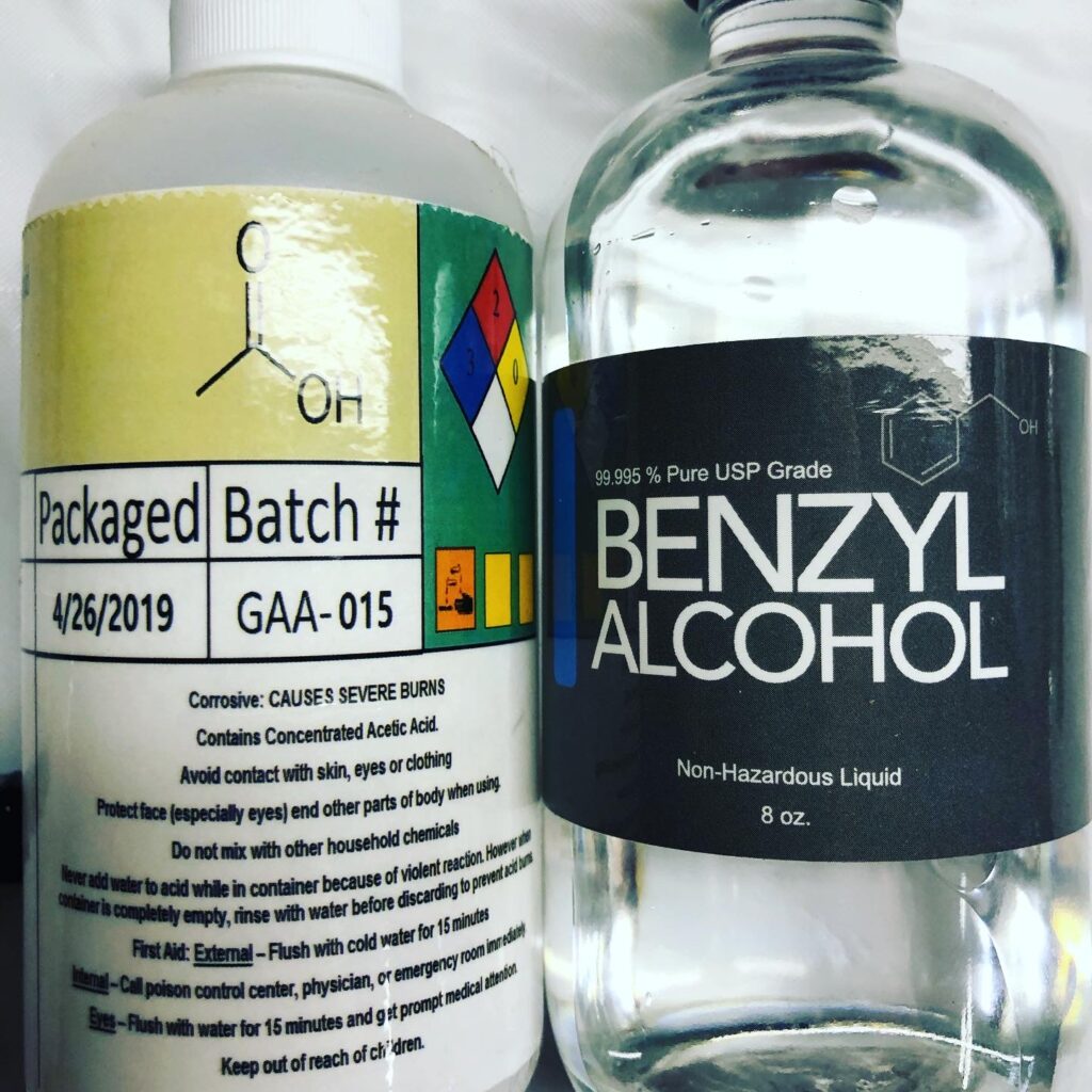 Lab grade Acetic acid on the left and benzyl alcohol on the right.
